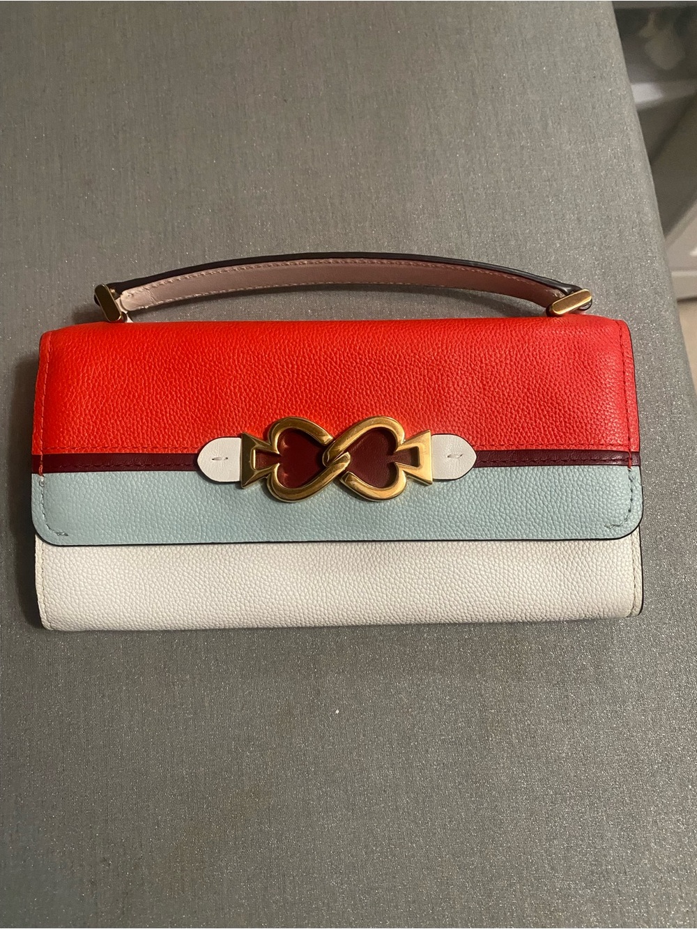 kate spade Colorblock Top-Handle Clutch in Red, Light Blue, and White with chain